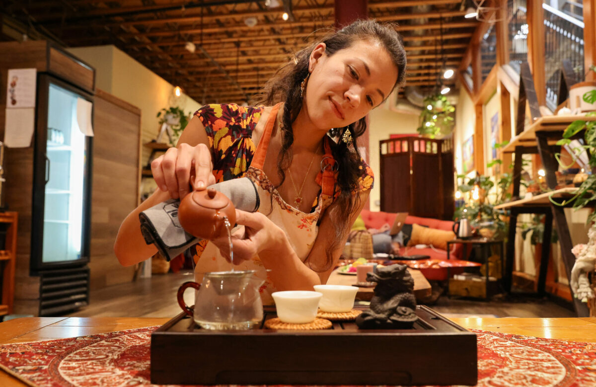 Kaya Suncat demonstrates how tea is prepared at Soft Medicine Sanctuary in Sebastopol. (Christopher Chung/The Press Democrat)
