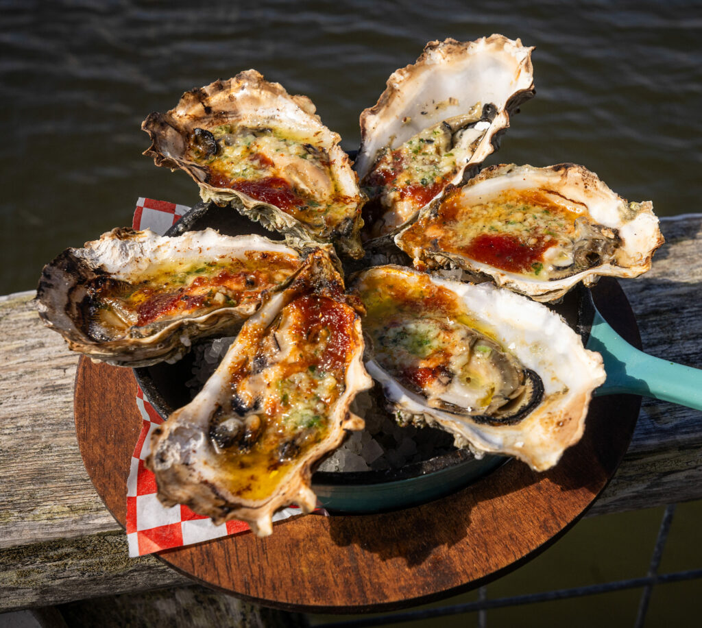 Nick’s BBQ’D Oysters fresh from the oven at the end of the dock on Tomales Bay Monday, September 18, 2023 at Nick’s Cove Restaurant. (John Burgess/The Press Democrat)