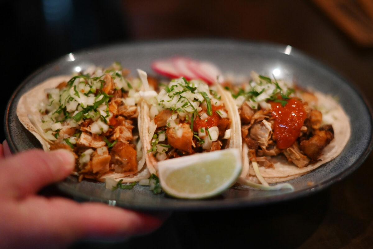 Mole braised pork shoulder tacos made using electric powered cooking units at Oso Sonoma restaurant in Sonoma, Calif. on Saturday, Feb. 4, 2023. (Erik Castro / For The Press Democrat)