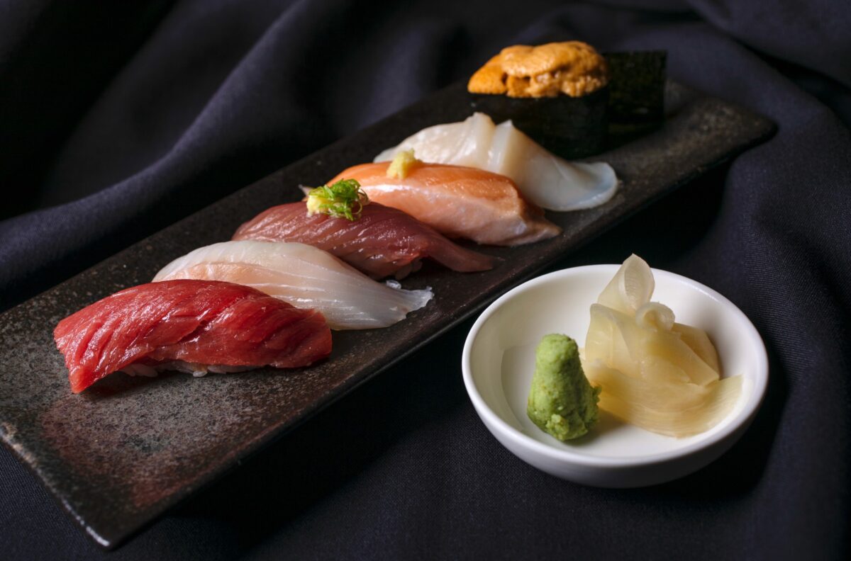 Keita Tominaga’s chef choice, from left: omakase nigiri, hon-maguro, ishigakidai, katsuo, iwana, hotate, and uni at Hana Japanese Restaurant in Rohnert Park September 21, 2022. (Chad Surmick / The Press Democrat)