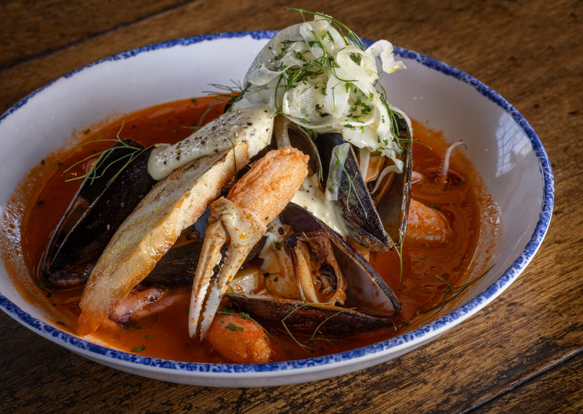 Nick’s Cove Cioppino with mussels, snow crab, calamari, rock cod, tomato broth, fennel, aioli and grilled baguette from Nick’s Cove Restaurant on Tomales Bay Monday, September 18, 2023. (Photo John Burgess/The Press Democrat)