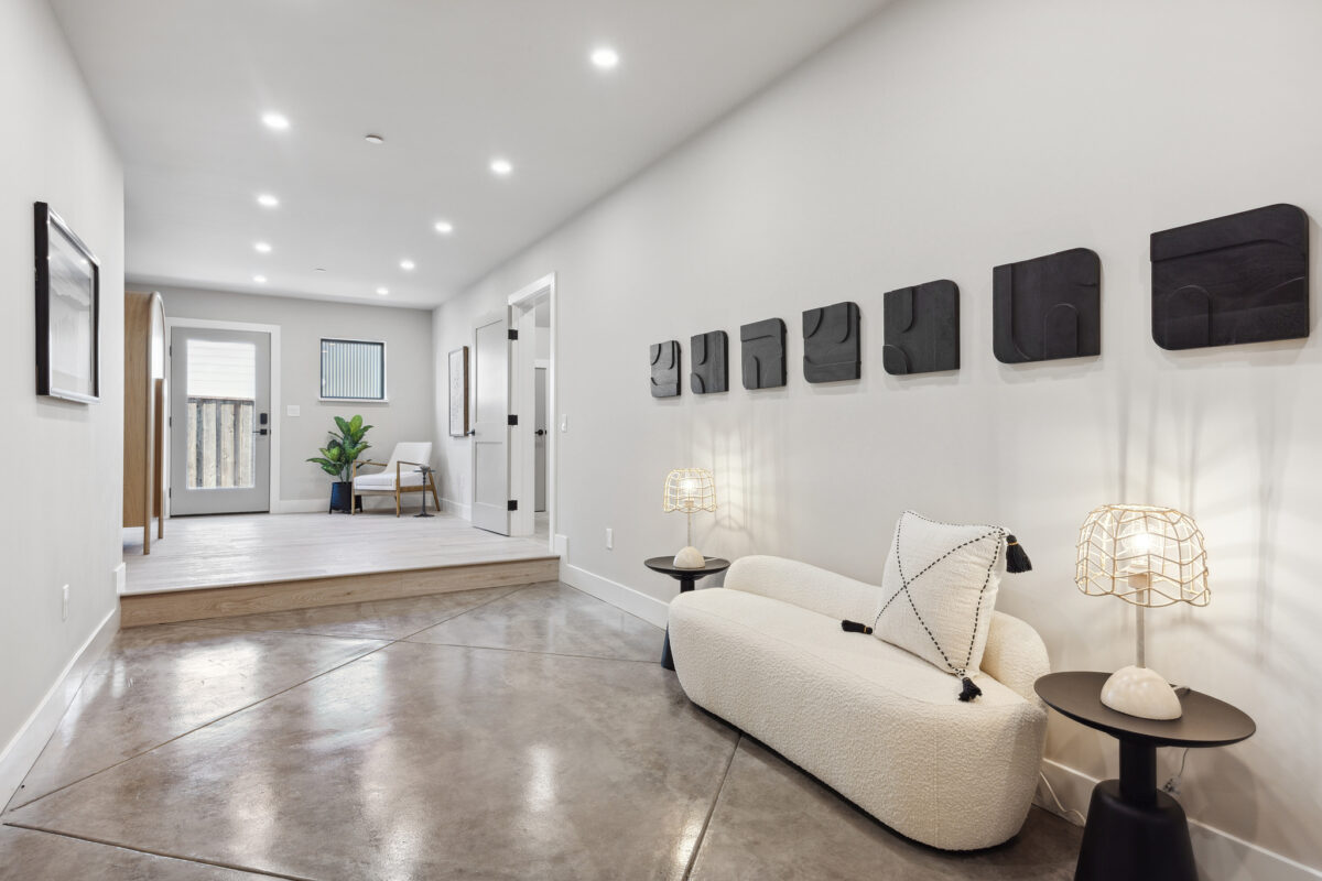 Living room in the pool house from which the ADU is accessible. (Tom Rohrer)
