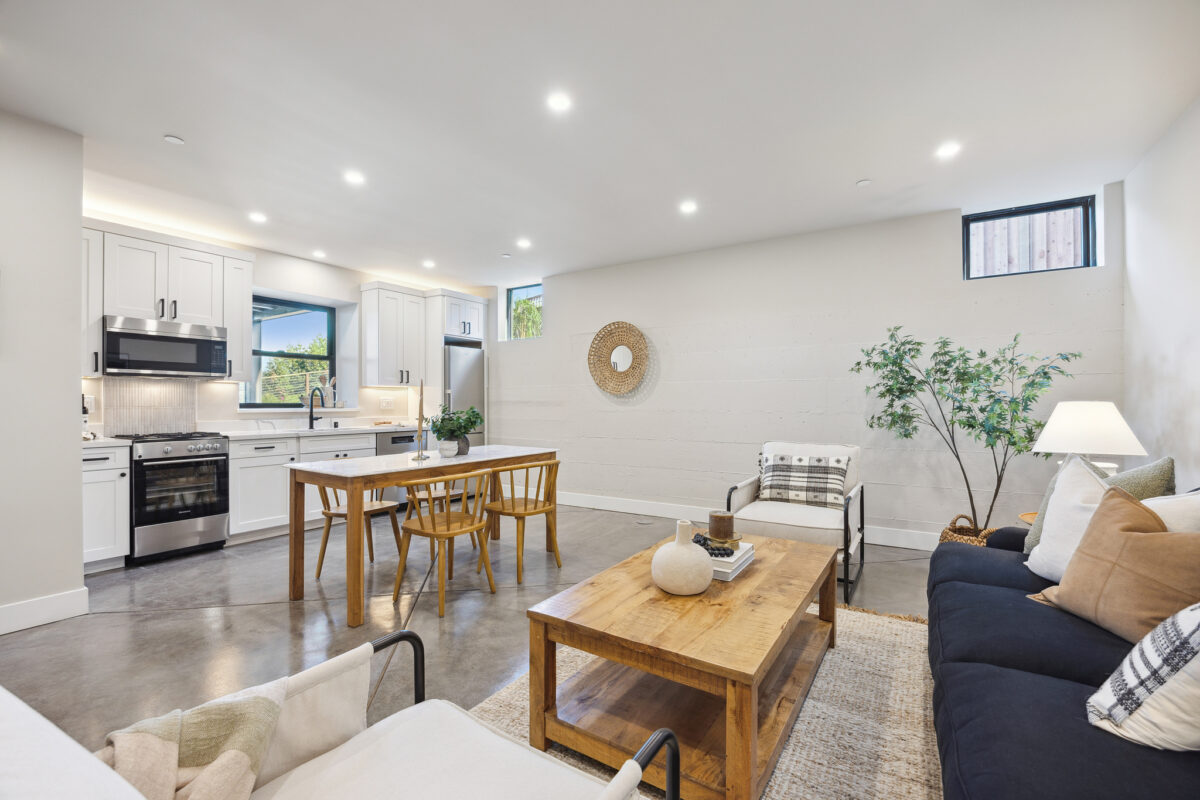 The kitchen, eating area and seating area in the great room of the ADU. (Tom Rohrer)