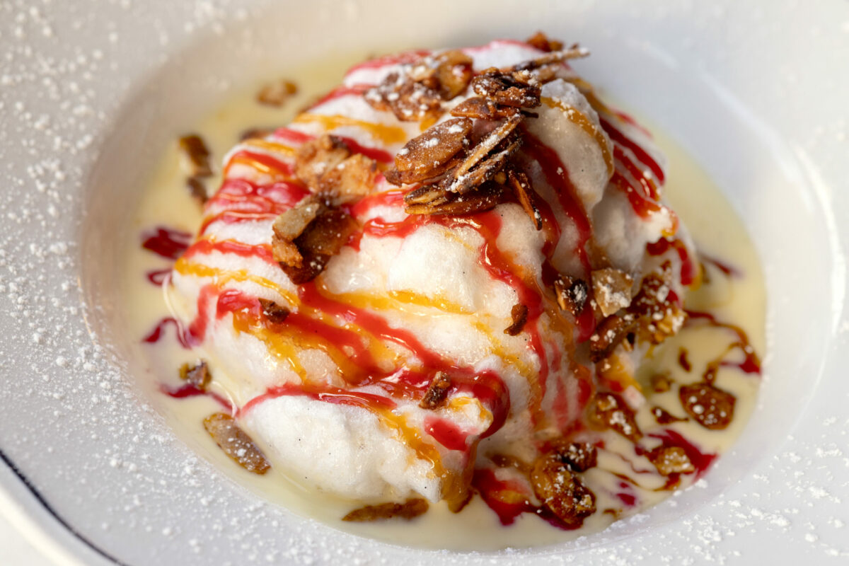 Floating Islands with Grand Marnier créme anglaise and caramelized almonds from Augie’s French Tuesday, November 28, 2023, on Courthouse Square in Santa Rosa. (John Burgess/The Press Democrat)