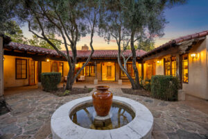 Courtyard with a fountain. (Open Homes Photography / Sotheby's International Realty)