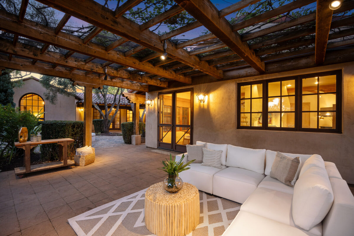 Seating area under the awning. (Open Homes Photography / Sotheby's International Realty)