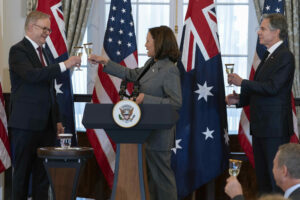 Vice President Kamala Harris toasts with Australia's Prime Minister Anthony Albanese, left, and Secretary of State Antony Blinken during a state luncheon at the State Department in Washington, Thursday, Oct. 26, 2023. (AP Photo/Jose Luis Magana)