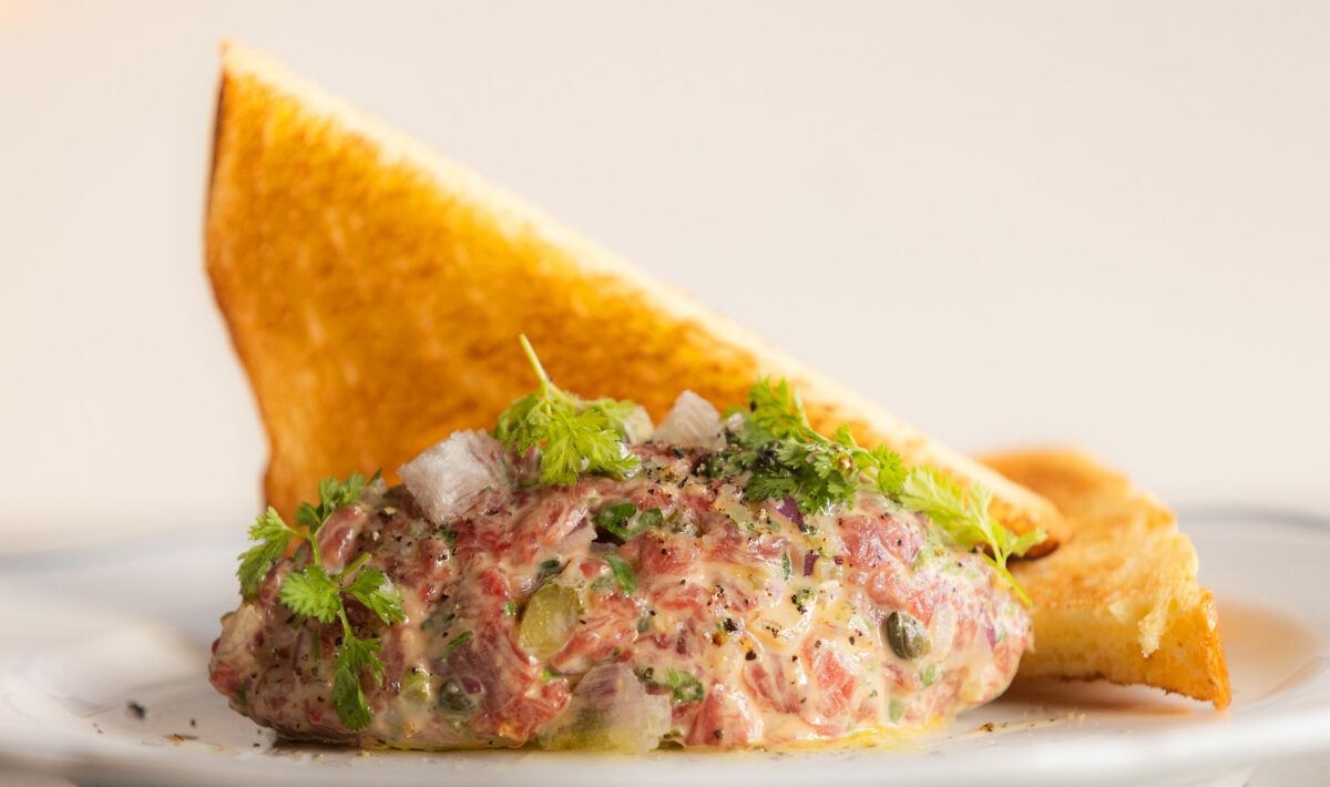 Steak Tartare of prime filet mignon, classic condiments & toast from Augie’s French Tuesday, November 28, 2023 on Courthouse Square in Santa Rosa. (Photo John Burgess/The Press Democrat)