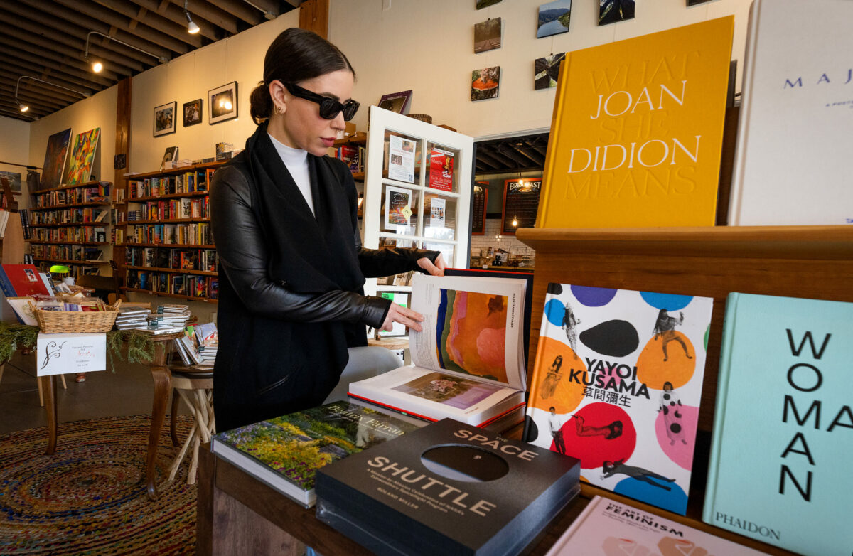 Local resident Shariyah Scalise browses at Russian River Books and Letters in Guerneville Wednesday, December 13, 2022. (John Burgess/The Press Democrat)