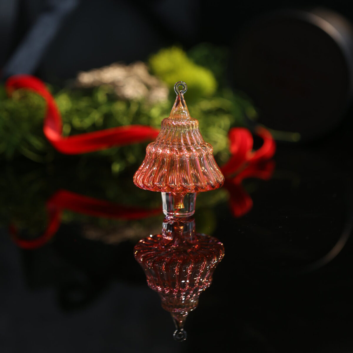 Tree Technique: This unique color of this blown glass ornament is achieved by encasing 24k gold smoke. $42 (and up), Dickinson Glass, The Barlow, 6770 McKinley Street, Suite 120, Sebastopol, dickinsonglass.com