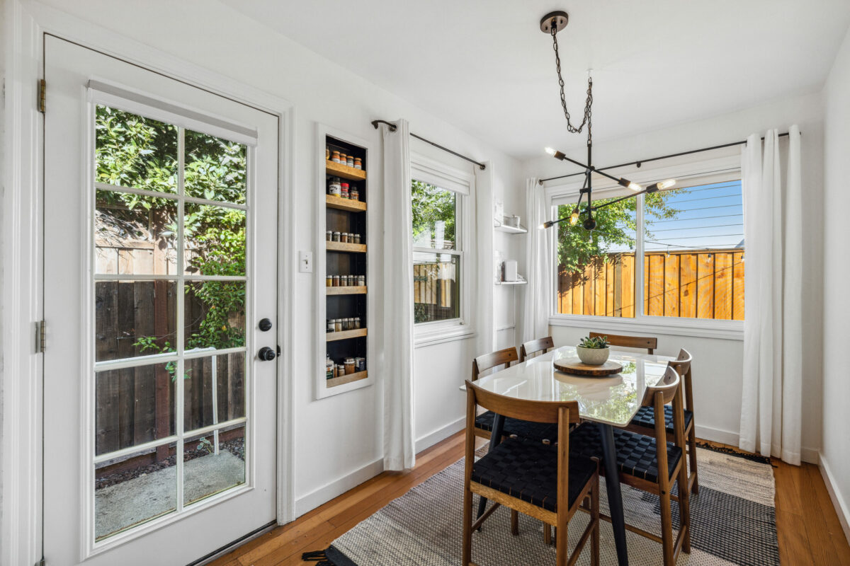 Modern light fixtures blend in with the home's vintage style. (Open Homes Photography)