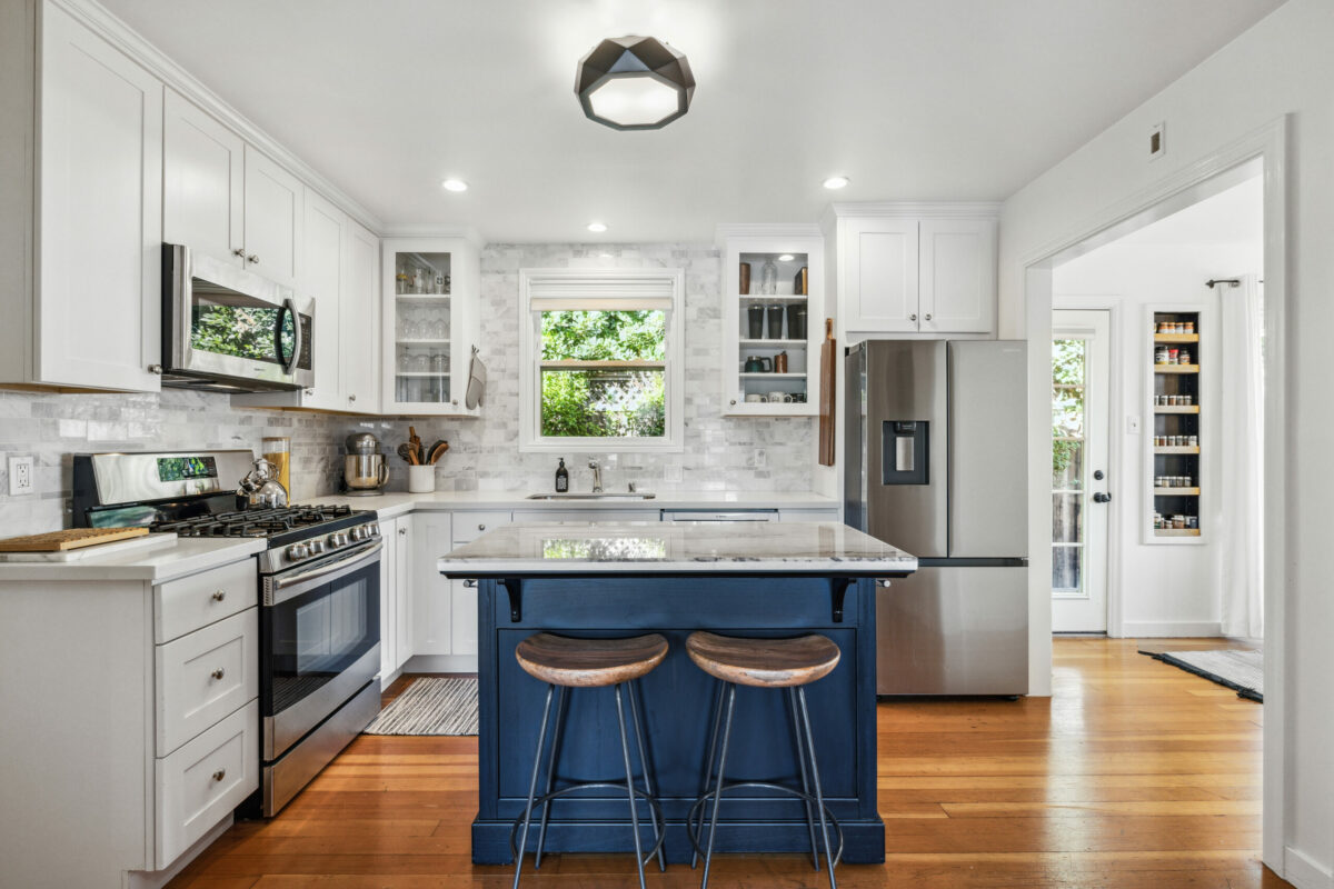 Great use of space is achieved with a small eat-in counter and prep area. (Open Homes Photography)