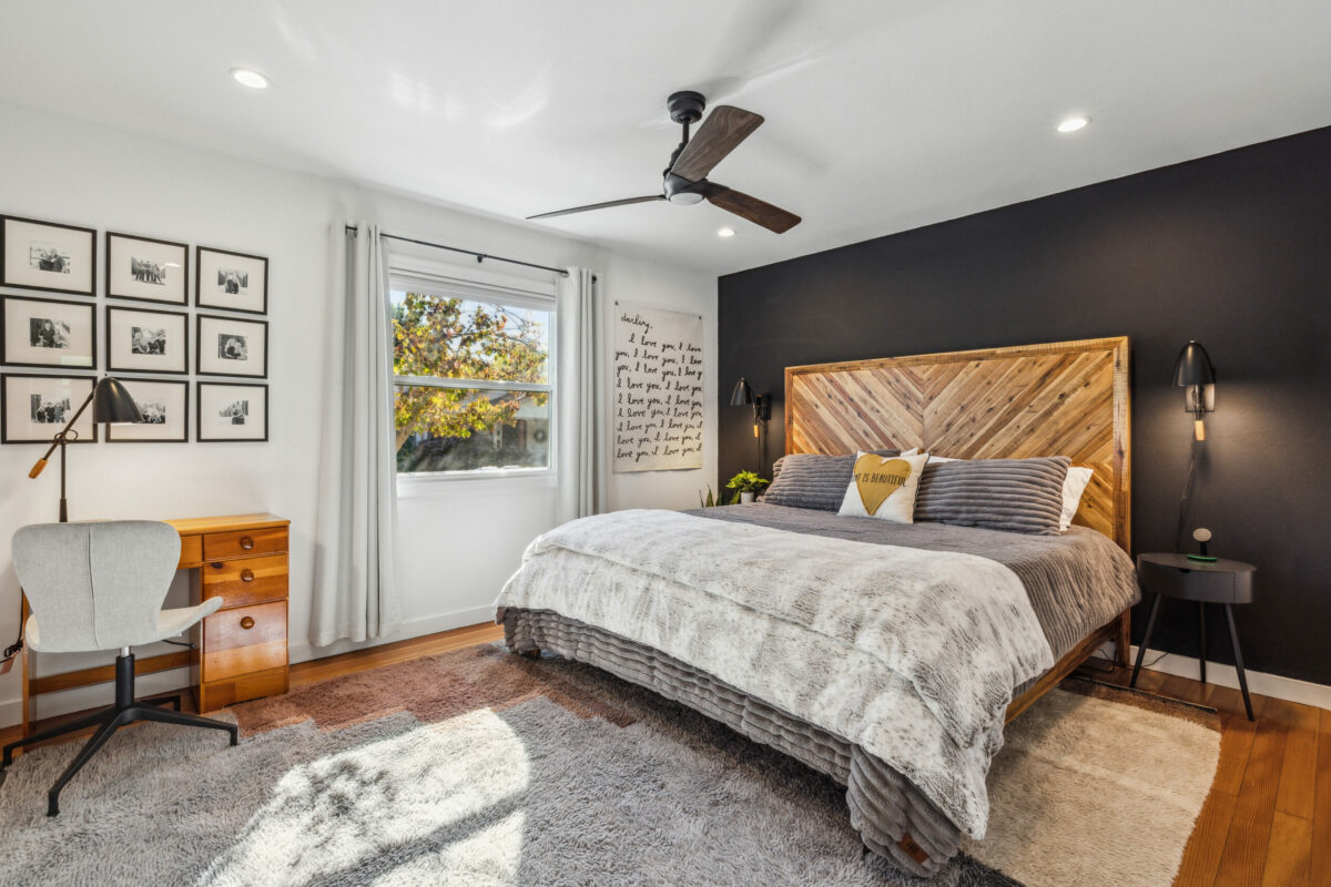 Deep-toned accent walls are dramatic yet neutral, adding interest to the rooms. (Open Homes Photography)