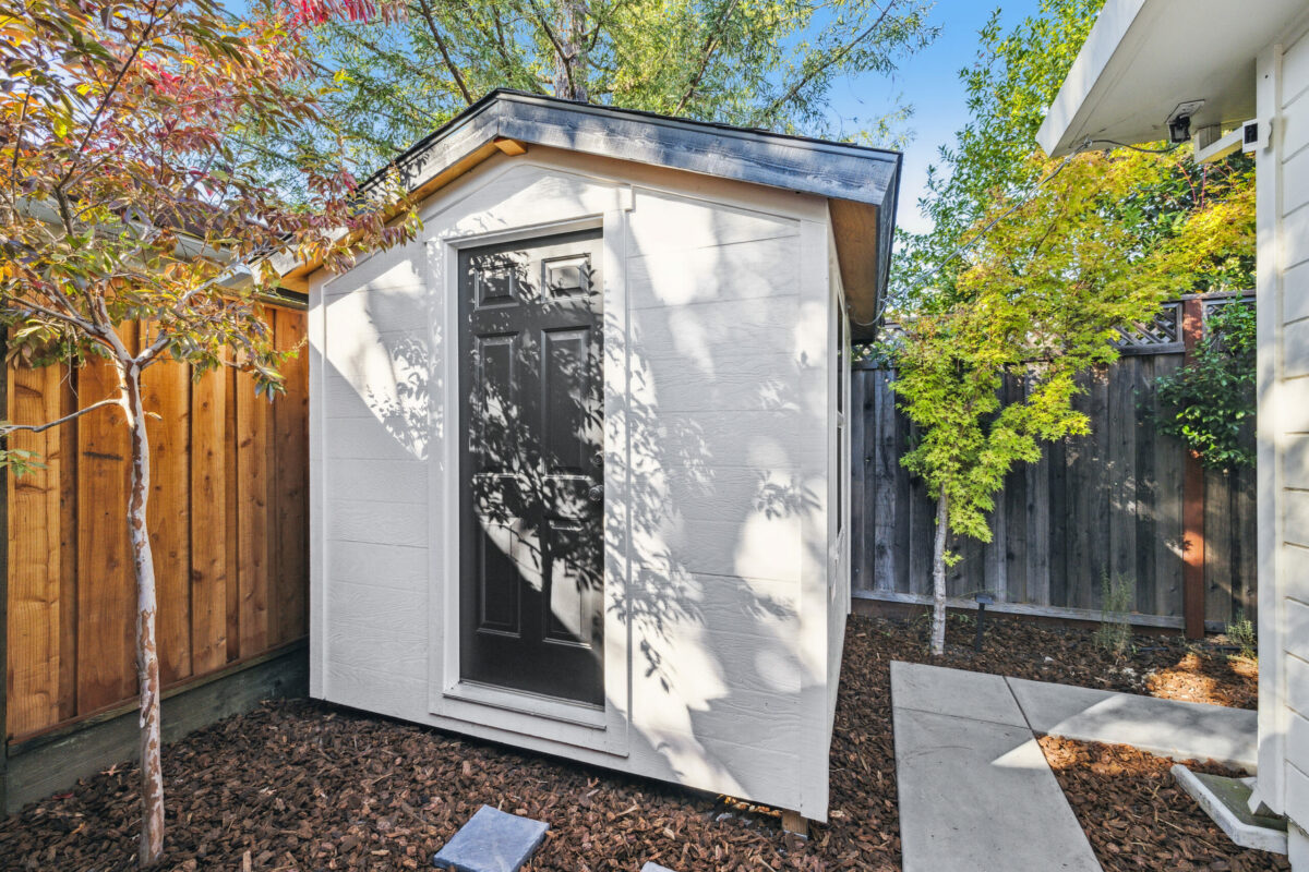 This finished-out shed could function as an extra workspace. (Open Homes Photography)
