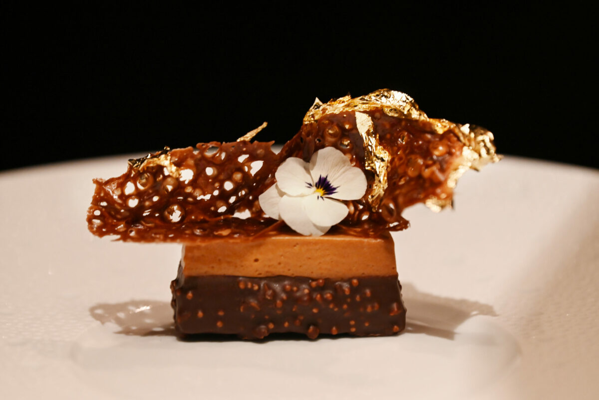 Gianduja chocolate pave with hazelnut praline, dentelle at Auro restaurant in Calistoga, Calif. on Thursday, Dec. 8, 2022. (Erik Castro / For The Press Democrat)