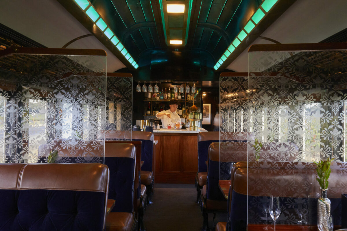 Napa Valley Wine Train cars are furnished with Honduran mahogany paneling, brass accents, etched glass partitions and plush armchairs. (Napa Valley Wine Train)