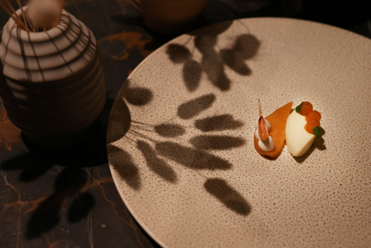 Golden pineapple quince teardrops with lemon balm mousse, chantilly at Auro restaurant in Calistoga, Calif. on Thursday, Dec. 8, 2022. (Erik Castro / For The Press Democrat)
