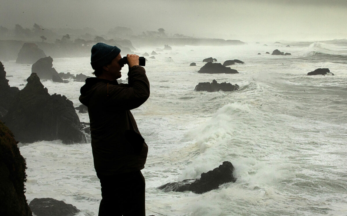 Grant Kjos drove up from his home in San Francisco to watch the giant waves pound the Sonoma Coast at Duncan’s Cove, Friday, Jan. 13, 2023. (John Burgess / The Press Democrat)