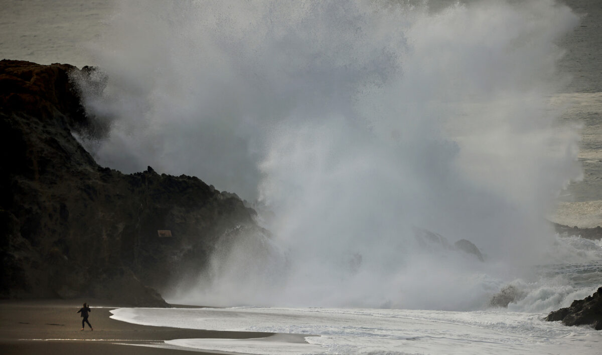 Coupled with a heavy surf and a tsunami advisory for the West Coast, large waves crash ashore at Wrights Beach and Duncan's Landing, Saturday, Jan. 15, 2022, north of Bodega Bay. (Kent Porter / The Press Democrat)