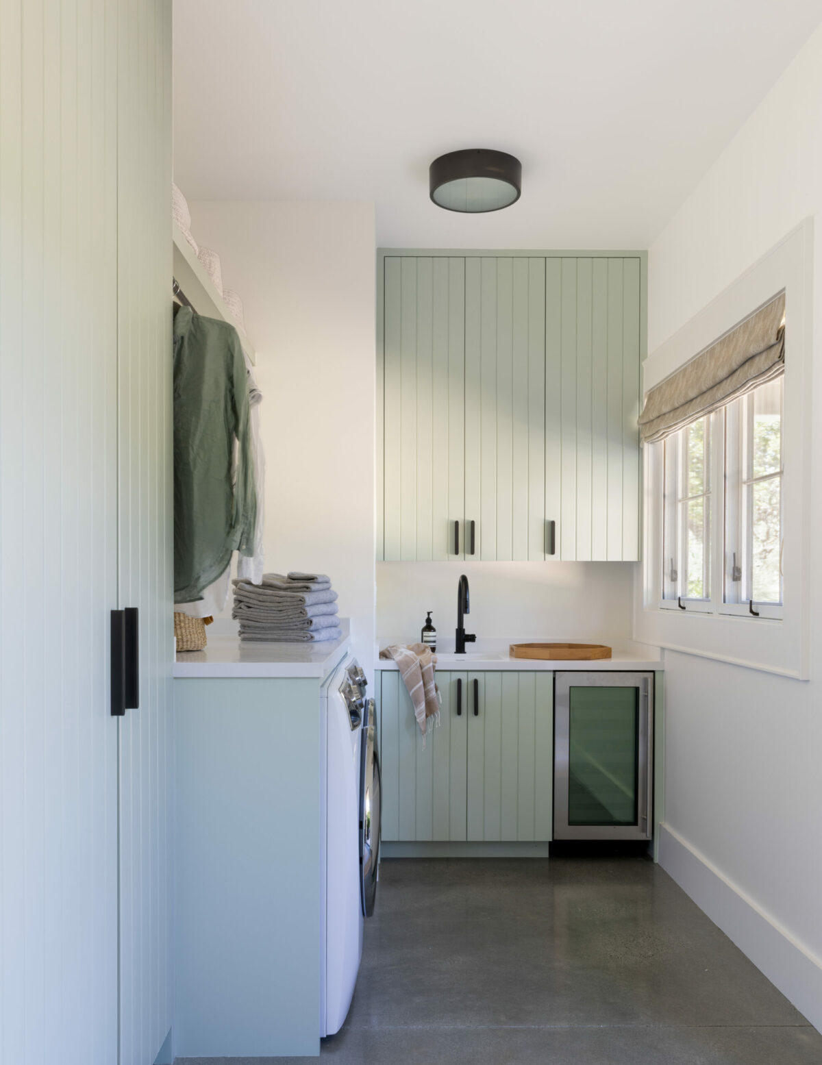 Custom ceiling-high cabinets allow for lots of storage. (Suzanna Scott)