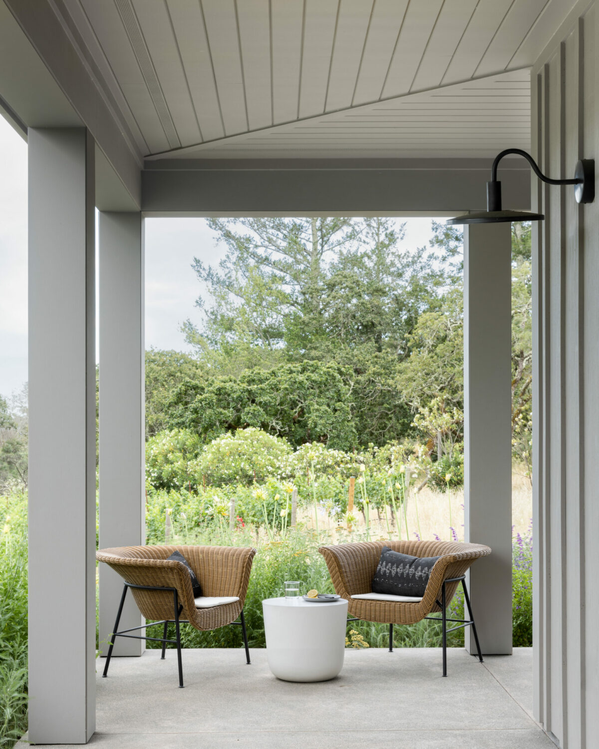 A seating area off the ADU allows for sitting among the salvia frequented by hummingbirds. (Suzanna Scott)