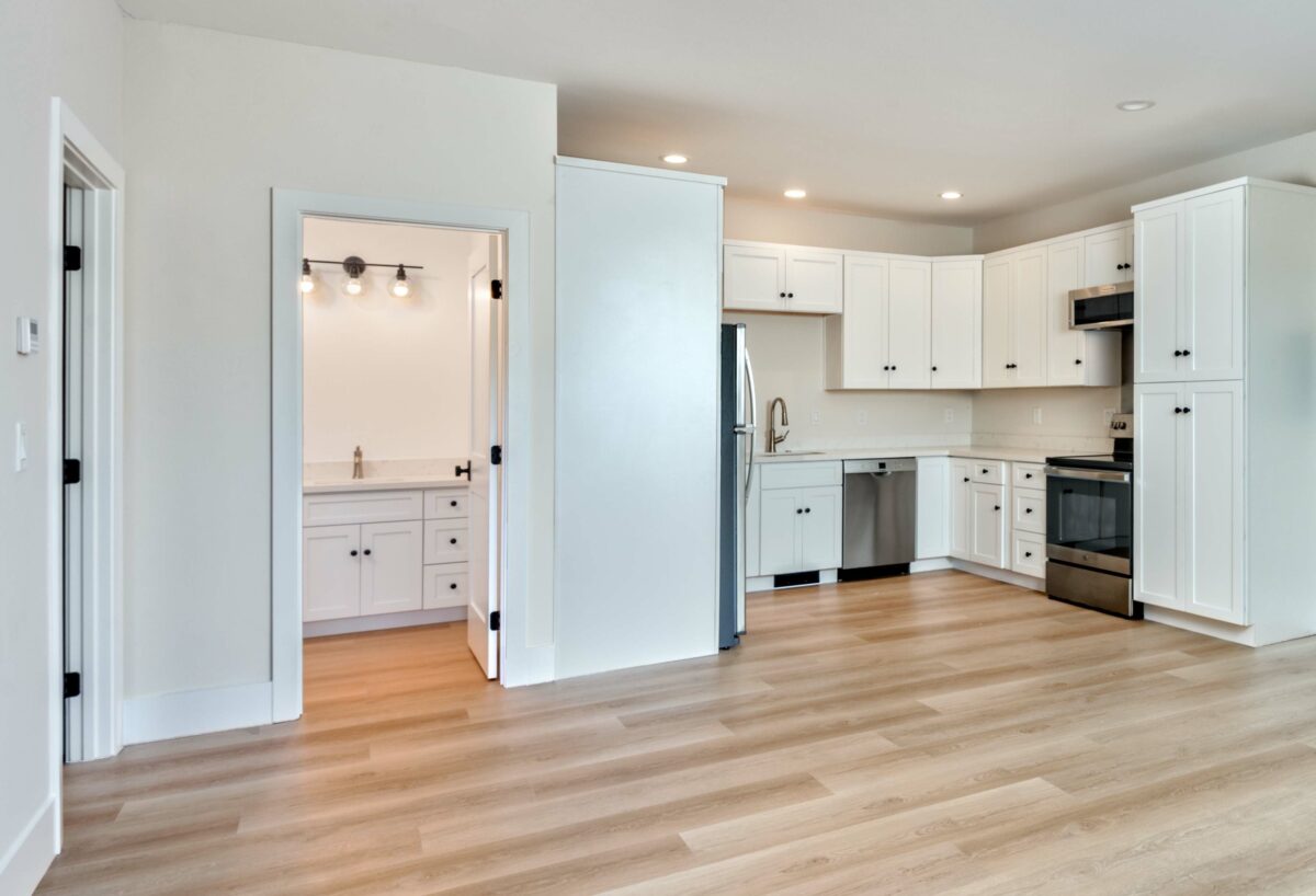 The ADU has a kitchen and great room, a bathroom, bedroom, and a separate garage. (Prosper Real Estate)