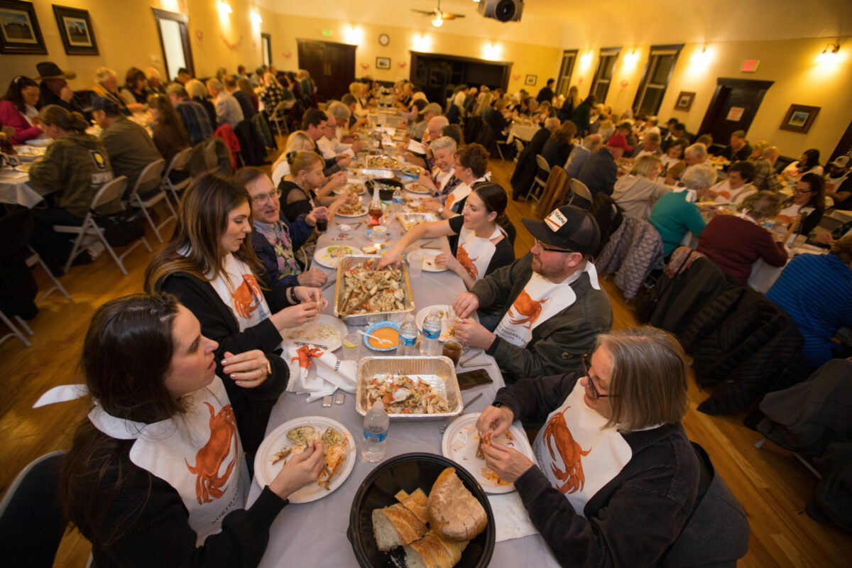 People begin eating crab during the Crab Feed Benefit presented by Penngrove Social Firemen at the Penngrove Community Clubhouse, Saturday, Jan. 21, 2023, in Penngrove. (Darryl Bush / For The Press Democrat)