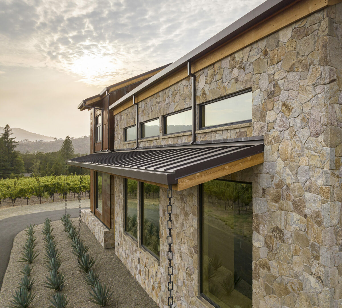 Architect Amy Alper chose aesthetic elements that channel the property’s past, its surroundings, and a look toward the future. (Adam Potts Photography)