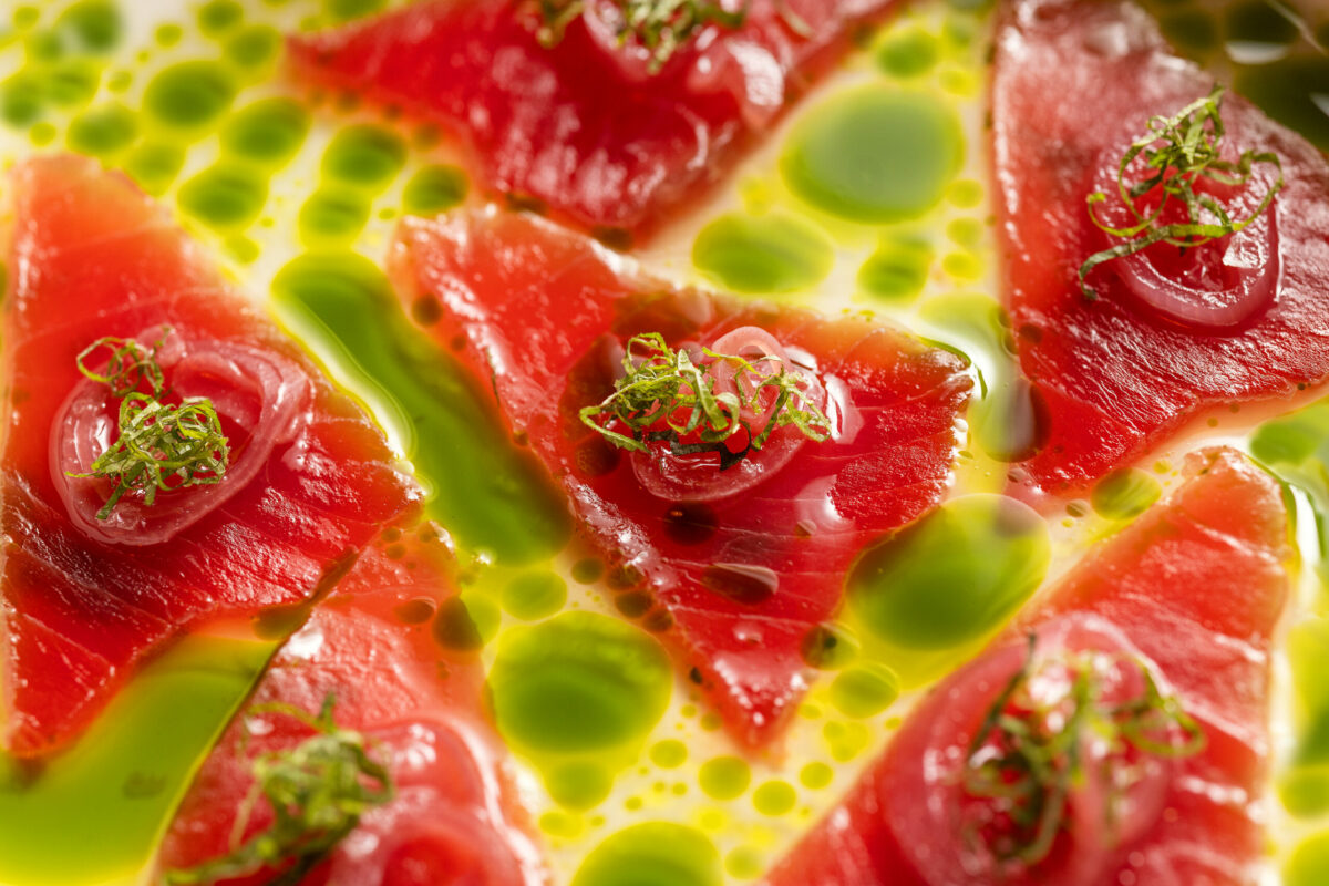 Tuna Crudo with tomato water, basil oil and shiso from the Golden Bear Station Thursday, January 11, 2023 on Hwy 12 in Kenwood. (Photo John Burgess/The Press Democrat)