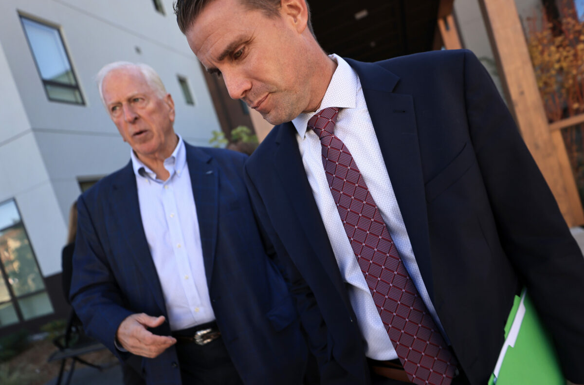 Mike McGuire, the California State Majority Leader, and Rep. Mike Thompson of California's 4th Congressional District, left, finish up a conversation, Friday, Oct. 27, 2023, prior to a celebration of the completion of phase one of Burbank Housing's affordable housing project on land that housed the Journey's End Mobile Home Park, razed in the 2017 Tubbs Fire. (Kent Porter / The Press Democrat) 