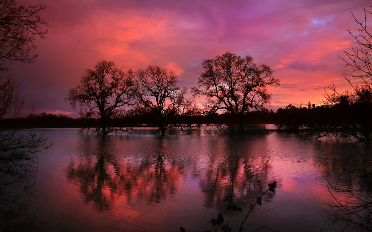 A brilliant sunset over the Laguna de Santa Rosa near Sebastopol. (Kent Porter / The Press Democrat)