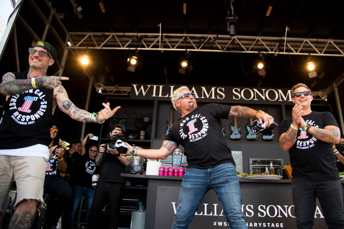 Celebrity chefs Michael Voltaggio, left, Guy Fieri, and Bryan Voltaggio appear on the Williams Sonoma Culinary Stage during BottleRock Napa Valley in Napa, Calif. on Saturday, Sept. 4, 2021.