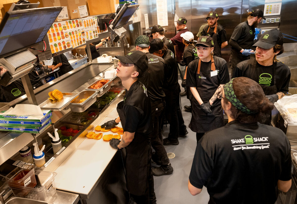 New trainees practiced during a lunch service for friends and family at the first Shake Shack in Sonoma County Wednesday, February 28, 2024. The popular franchise will open officially Thursday in Santa Rosa’s Montgomery Village. (Photo by John Burgess/The Press Democrat)