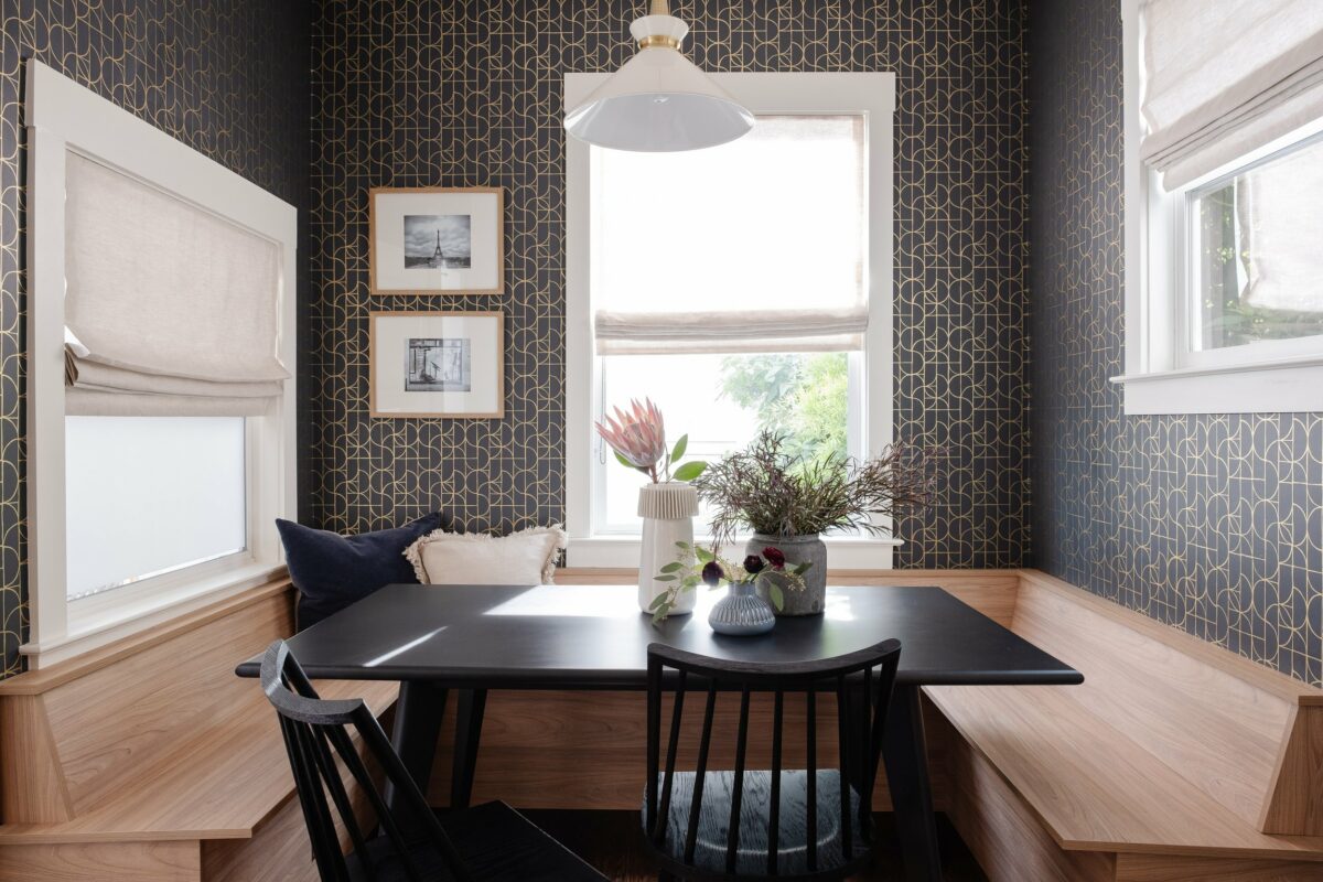 This seating area by Sebastopol designer and Storia Home proprietress Gina Gutierrez is both strong and serene. The wood banquette plus the creamy shades and light fixture provide an airy contrast to the rich-toned wallpaper. (Max Maloney / Gina Rachelle Design)
