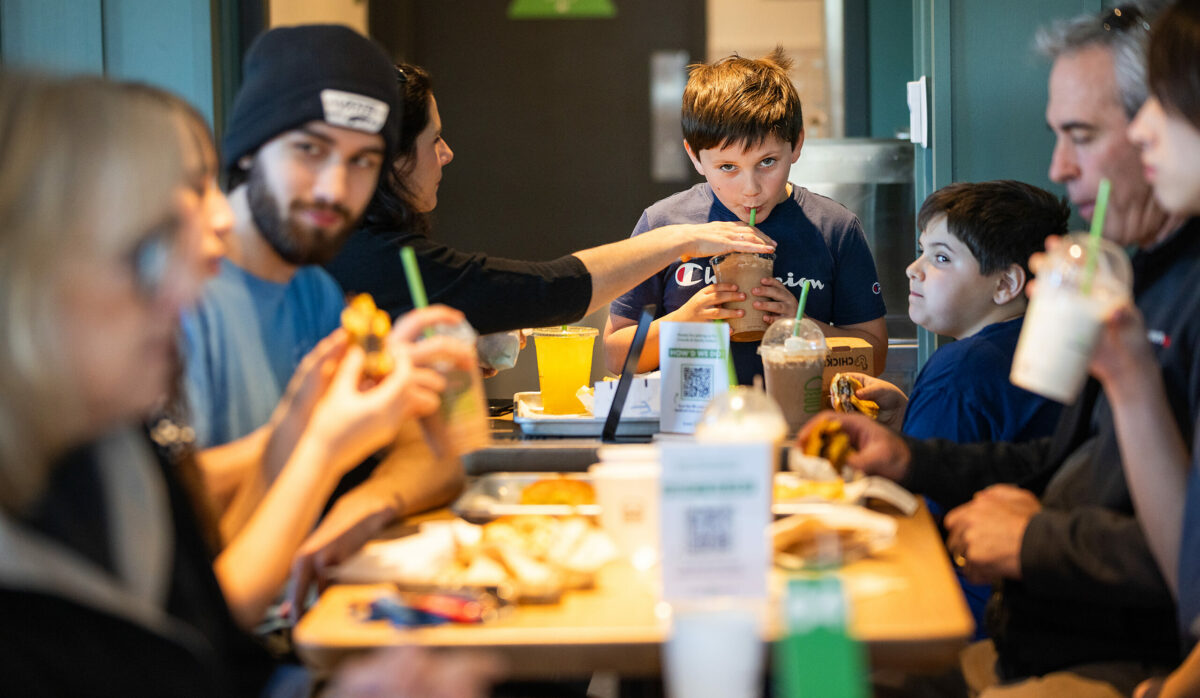David Astobiza, 6, slurps a shake during a practice lunch service for friends and family at Shake Shack Santa Rosa’s Montgomery Village Wednesday, February 28, 2024. (Photo by John Burgess/The Press Democrat)