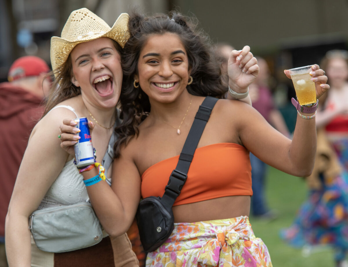 BottleRock Napa Valley guests enjoy a drink and music of The Peter Cat Recording Co. at the 10th annual BottleRock Napa Valley, Friday, May 26, 2023. (Chad Surmick / The Press Democrat)
