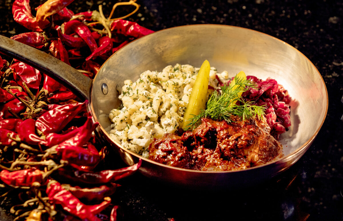 Goulash with buttered spätzle and braised red cabbage from Tisza Bistro chef/owner Krisztian Karkus Monday, February 12, 2024 in Healdsburg. (Photo by John Burgess/The Press Democrat)