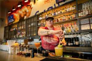 Bartender Ashleigh Grace prepares the cocktails at Easy Rider in Petaluma on Tuesday, March 1, 2022. (John Burgess/The Press Democrat)