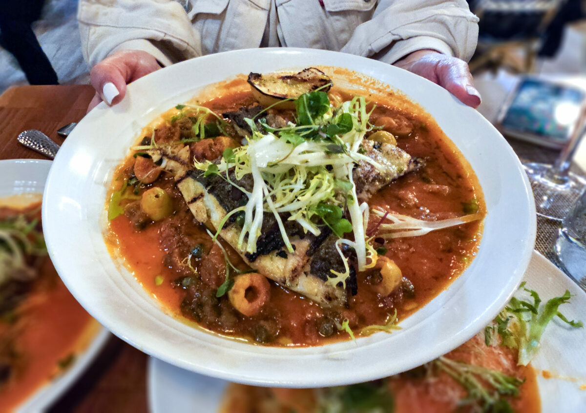 Branzino with olives at Mezzeluna restaurant in Cotati (Heather Irwin/The Press Democrat)