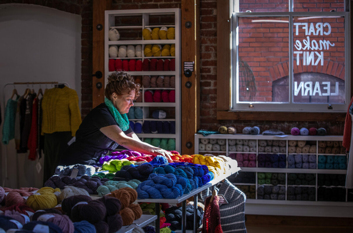 Justine Malone, the owner of Cast Away Yarn Shop in Santa Rosa’s Railroad Square. The local yarn shop with its walls of colorful yarn for sale, craft supplies and gifts has been a staple business in that area for over 10 years. (Chad Surmick / The Press Democrat)