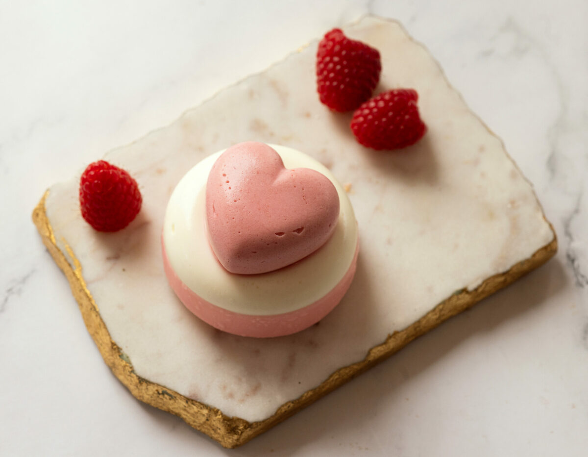 A Raspberry Mousse Heart with raspberry jam and crème fraîche mousse from chocolatier Robert Nieto, owner of Fleur Sauvage Chocolates Tuesday, Jan. 16, 2024, in Windsor. (John Burgess/The Press Democrat)