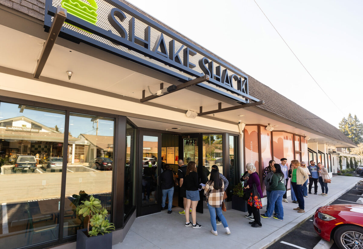 Friends and family line up for a “soft” opening of the first Shake Shack in Sonoma County Wednesday, February 28, 2024. New trainees practiced lunch service before the Thursday’s official opening in Santa Rosa’s Montgomery Village. (Photo by John Burgess/The Press Democrat)