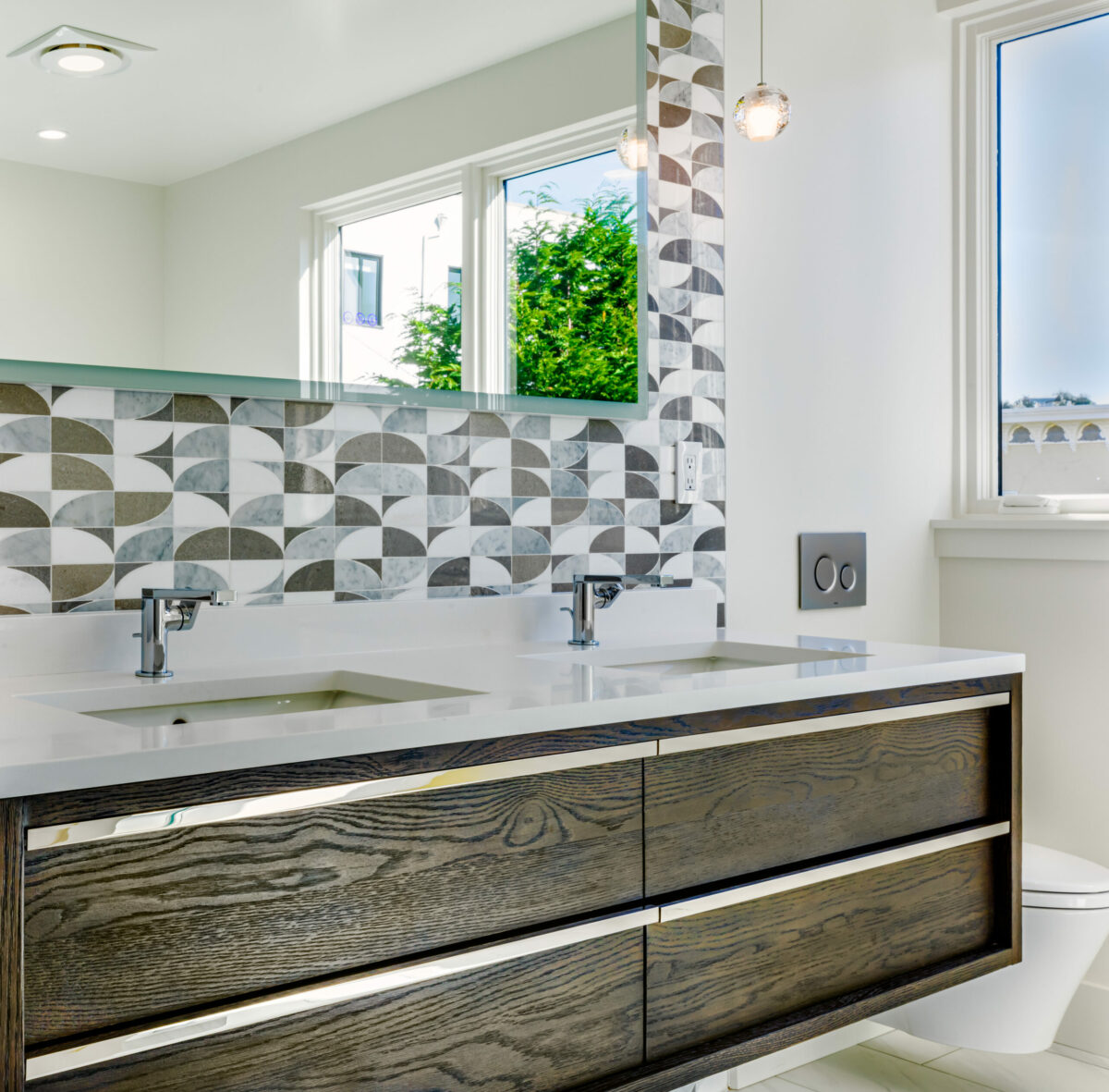 While a geometric backsplash is on the bolder side of the quiet spectrum, the use of subtle tones keeps things tranquil in this bathroom by Cesar Chavez Design. (Barry Schwarz)