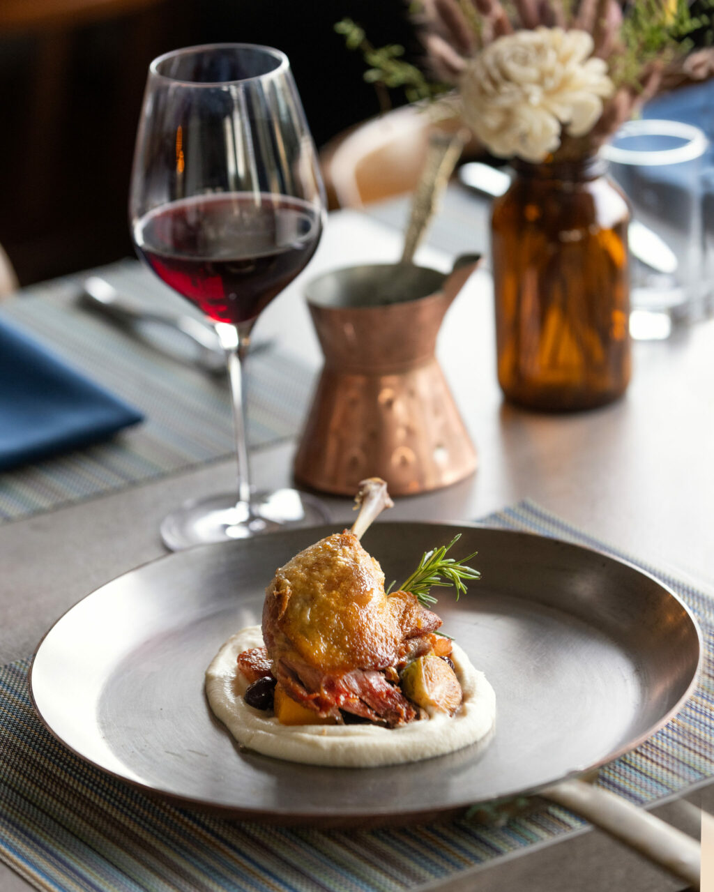Duck Leg Confit with celery root purée, caramelized vegetables, griottes and duck jus from Tisza Bistro chef/owner Krisztian Karkus Monday, February 12, 2024 in Healdsburg. (John Burgess/The Press Democrat)
