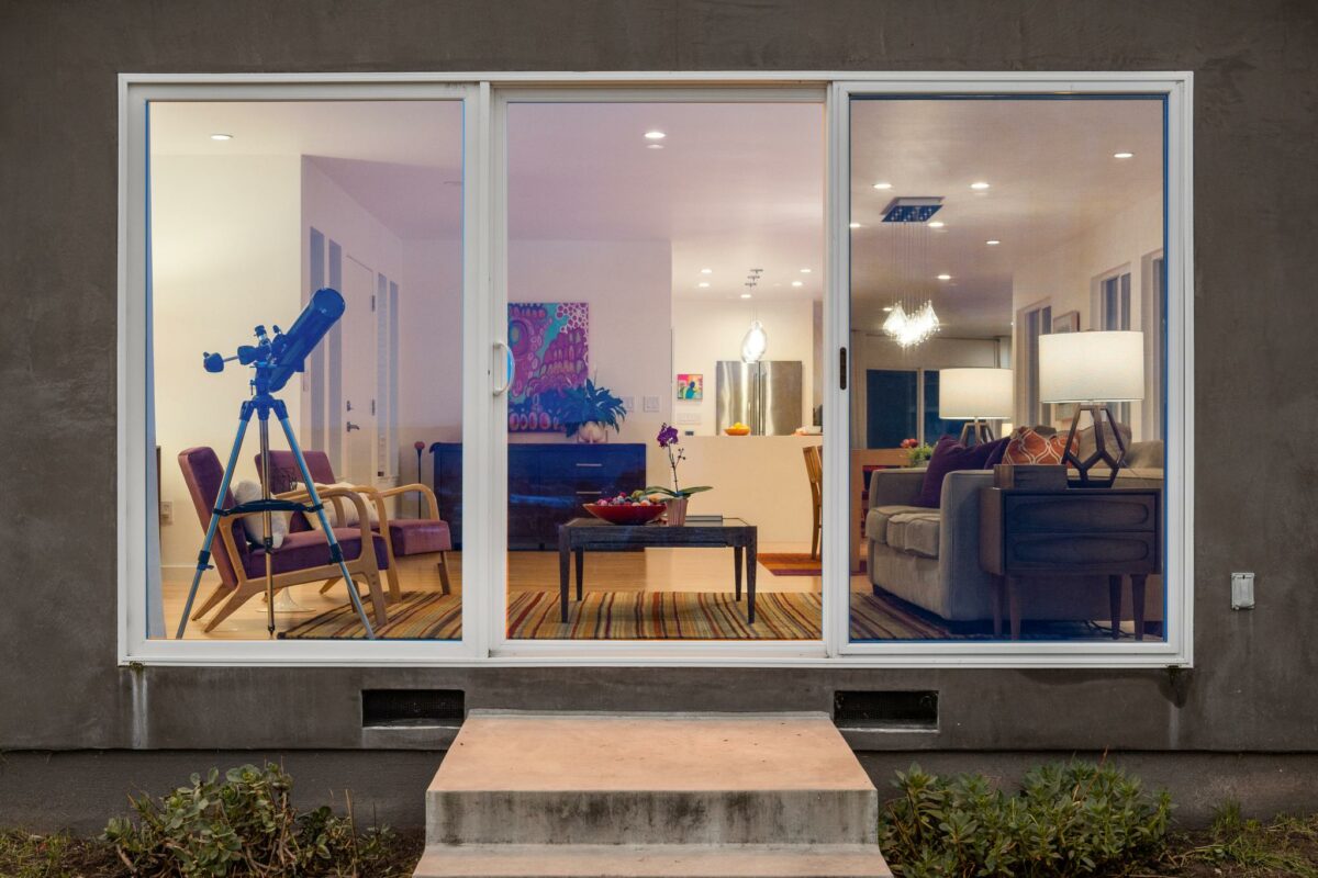 Sliders opening up to the backyard. (Compass Realty)