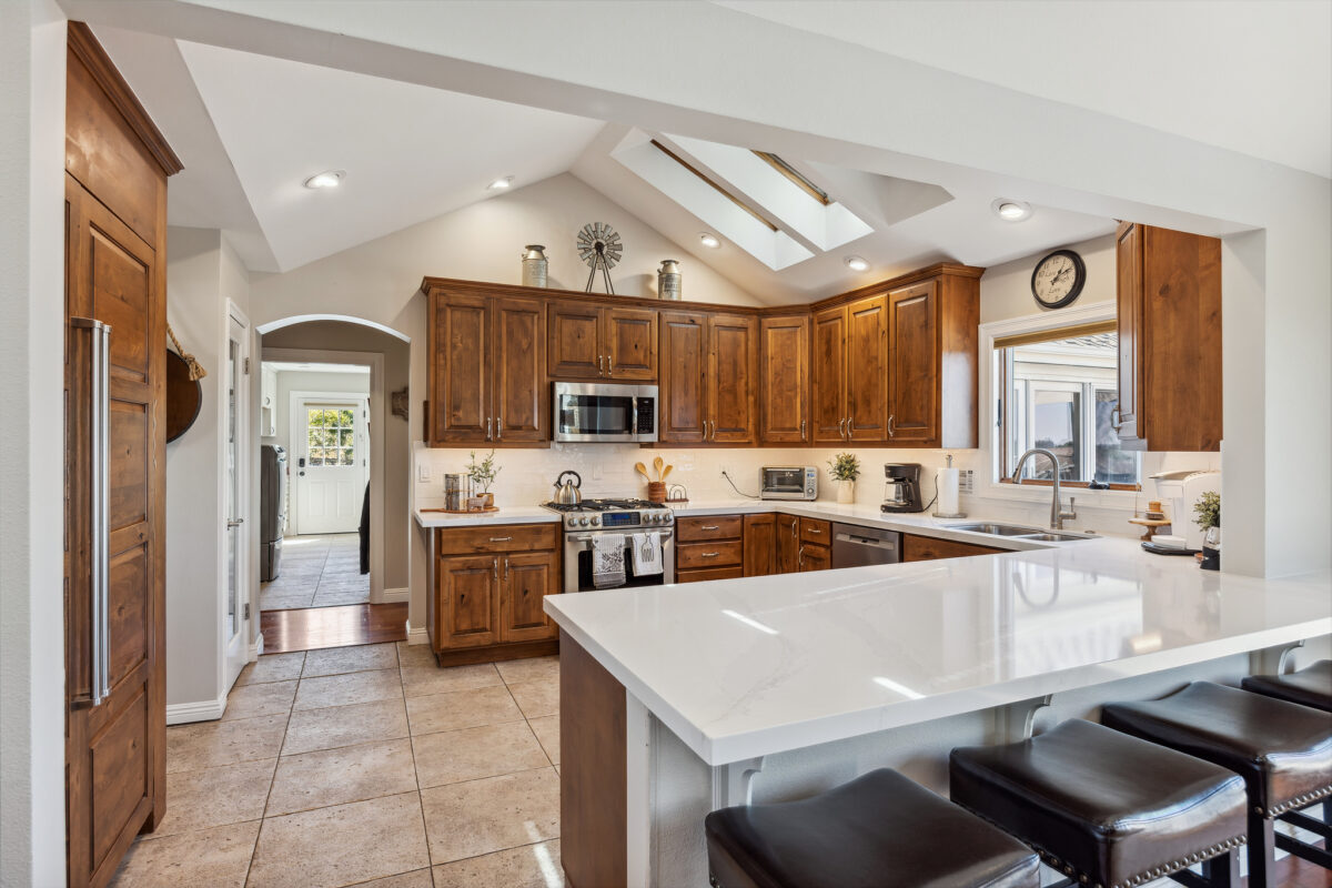 Kitchen with an eat-in counter. (Open Homes)