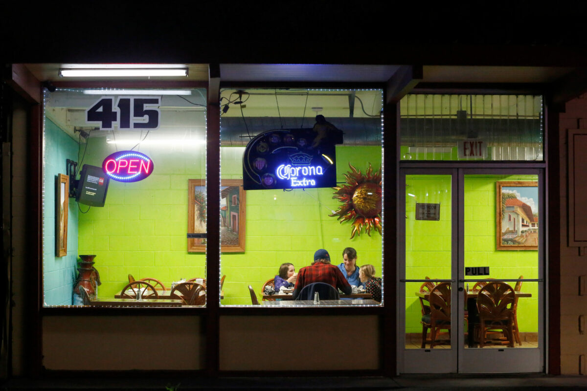 Mary and Jeremy Bardell and their daughters Maiya, 9, and Claire, 6, enjoy their family dinner at Taqueria Las Palmas in the Julliard Park neighborhood of Santa Rosa Avenue, in Santa Rosa on Sunday, January 17, 2016. (Alvin Jornada / The Press Democrat)
