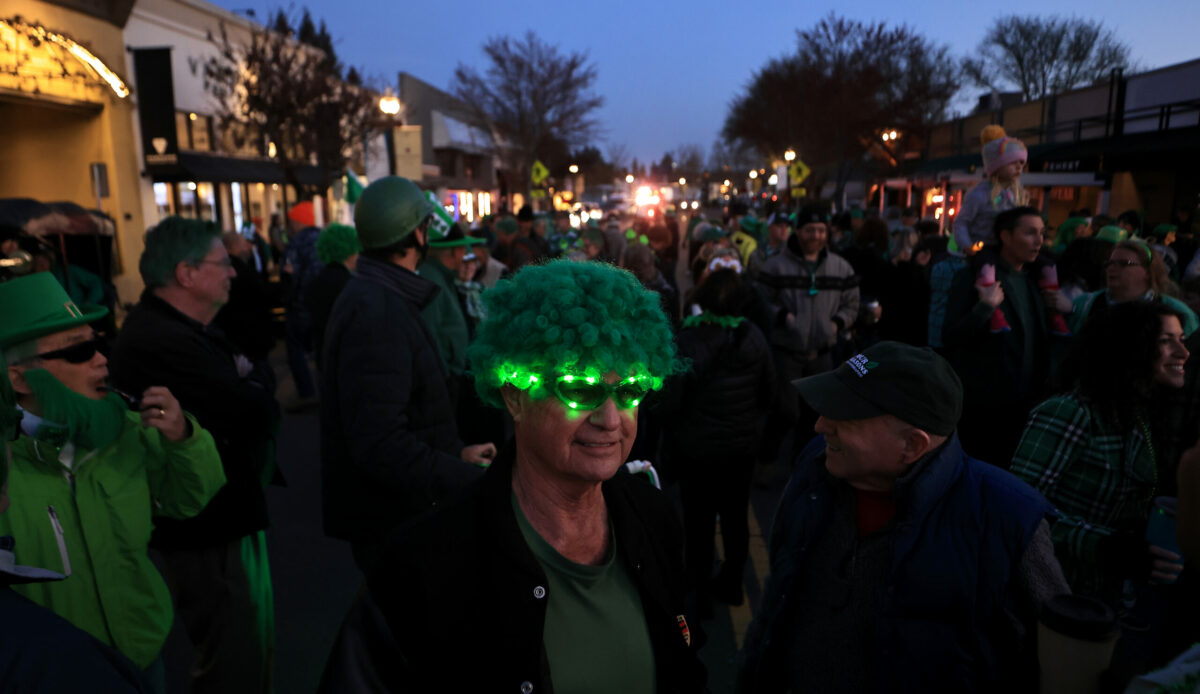 Participants in Healdsburg's St. Patrick's Day Parade take to Healdsburg Avenue, Friday, March 17, 2023, prior to the start of the parade. (Kent Porter / The Press Democrat)