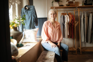 Theresa Hughes in her workspace and clothing retail shop Saint November in Santa Rosa's SOFA district. (Erik Castro/for Sonoma Magazine)