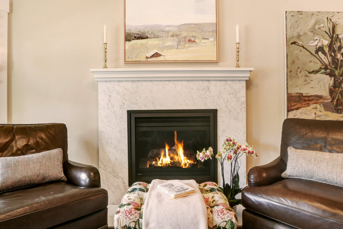 Ornamental finishes are often anything but quiet. Samuel Lowe, of SDL Residential, gives this traditional Sonoma home a tranquil makeover thanks to a clean-lined mantel, a marble fireplace, and earthy hues. (Courtesy of SDL Residential)